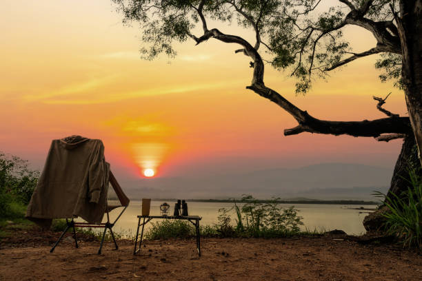 istock Empty chair with sunset view. Camping and outdoor lifestyle. 1618837819