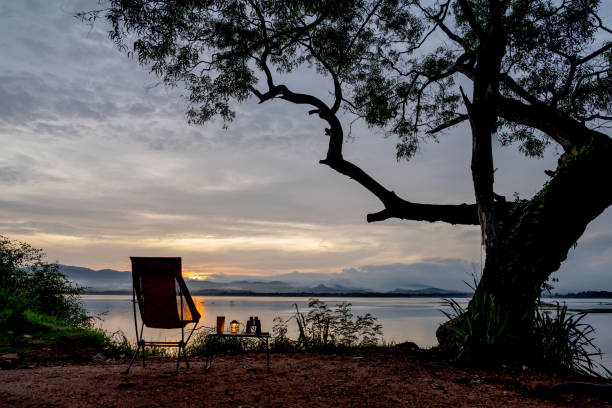Empty chair with sunset view. Camping and outdoor lifestyle.
