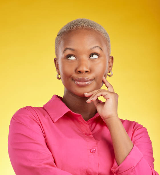Annoyed, face and black woman in studio with bad attitude, rolling eyes or doubt emoji on yellow background. Wtf, whatever and bored African female frustrated by drama, gossip or fake news reaction Annoyed, face and black woman in studio with bad attitude, rolling eyes or doubt emoji on yellow background. Wtf, whatever and bored African female frustrated by drama, gossip or fake news reaction rolling eyes irritation displeased facial expression stock pictures, royalty-free photos & images