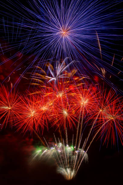 istock beautiful colorful firework display set and reflec on water for celebration happy new year and merry christmas and  fireworks on black background 1618856631