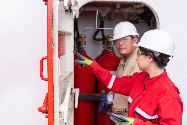 istock Tablet tech in industry: engineer assessing machinery 1618856634