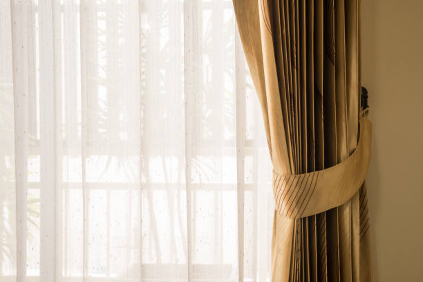 istock Beautiful curtain window decoration in bedroom interior hotel. 1618882648