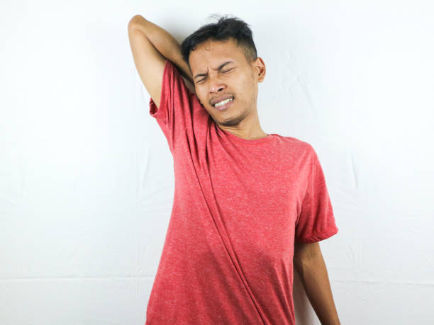 istock Tired asian man with yawn face expression, sleepy and back pain on white background 1618898836