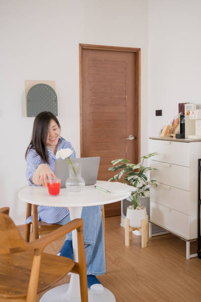 istock asian woman freelancer relax and happy during working from home 1618948042