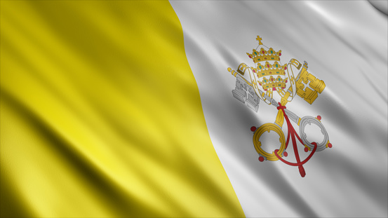Close-up view of the Vatican national flag waving in the wind. The Vatican City is an independent city-state and enclave surrounded by Rome, Italy. Fabric textured background. Selective focus
