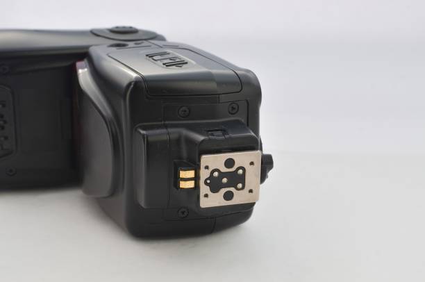 istock Professional black photo flash to provide perfect lighting in any environment. Ideal for projects related to photography and lighting. Providing intense, controlled light for amazing photographs. 1618976085