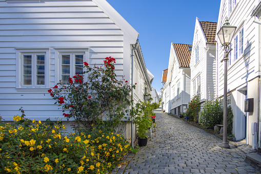 Early morning views of the old town of Stavanger (Gamle Stavanger), showing the quiet, empty, quaint cobbled streets before they get busy with tourists from the regular cruise ship arrivals