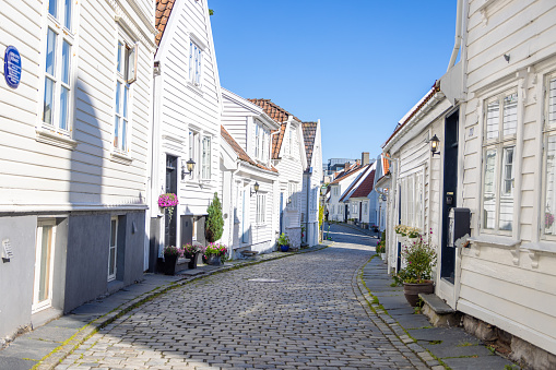 Early morning views of the old town of Stavanger (Gamle Stavanger), showing the quiet, empty, quaint cobbled streets before they get busy with tourists from the regular cruise ship arrivals