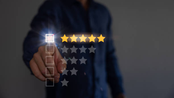 istock Increase rating, evaluation and classification concept. Businessman draw five yellow star to increase rating of his company. 1619052962