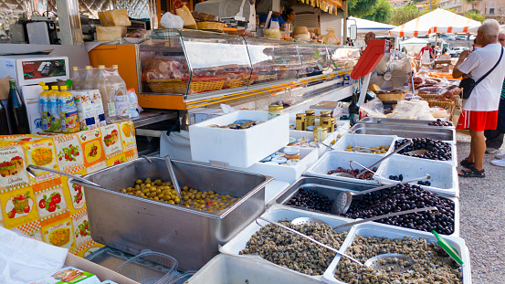 The local food market in Tropea town with olives and other delicious ingredients.