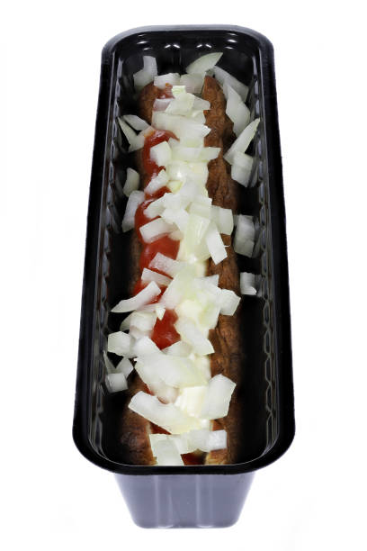 Dutch frikandel speciaal in a black plastic container Dutch frikandel speciaal in a black plastic container isolated on white background frikandel speciaal stock pictures, royalty-free photos & images