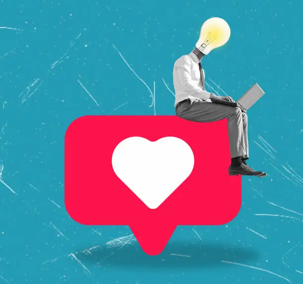 Photo of The concept of dating or love correspondence on the Internet. A man with a light bulb instead of a head.