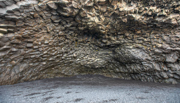 istock Amazing volcanic rock formations - Reynisdrangar rock formations and black beach - Vik, Iceland 1619142688