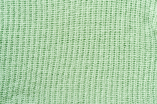 Mint coloured knitted sweater texture