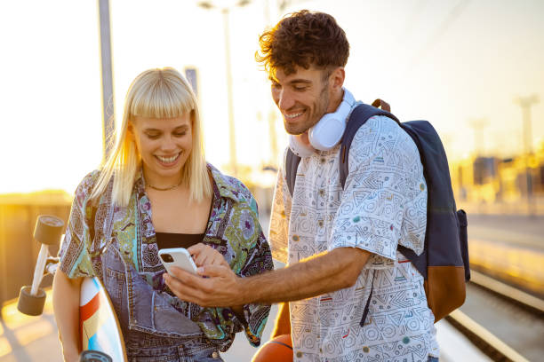 istock Urban people using smart phone in the city 1619174200