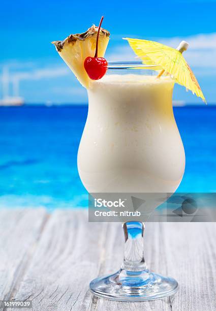 Tropical Cocktail Stock Photo - Download Image Now - Beach, Drink Umbrella, Summer