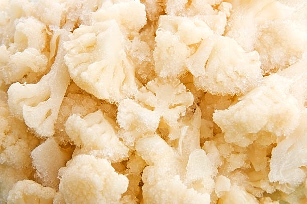 produtos hortícolas congelados - cauliflower vegetable portion cabbage imagens e fotografias de stock