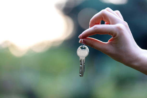 istock Handing over the house keys 1619193292