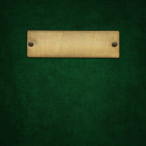 Bronze plaque Bronze plaque on green background bronze plaque texture stock pictures, royalty-free photos & images