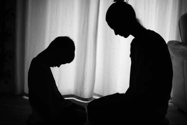 istock Sad and helpless mother and child at home. 1619248209