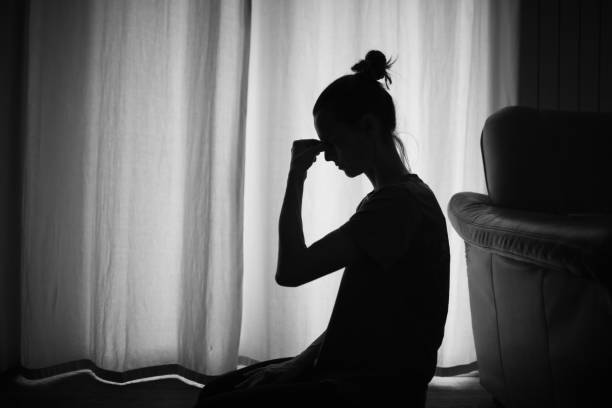 istock Stressed woman at home. 1619248789