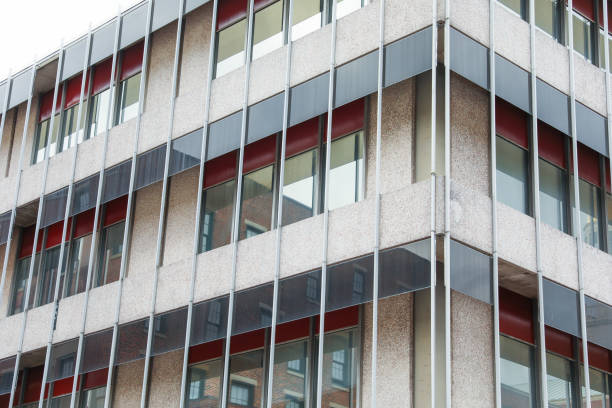 istock Glass-clad skyscraper represents modern real estate: growth, ambition, urbanization. Symbol of prosperity and industry in cityscape 1619260968
