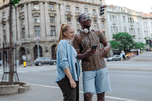 istock Tourists in a big city 1619261197