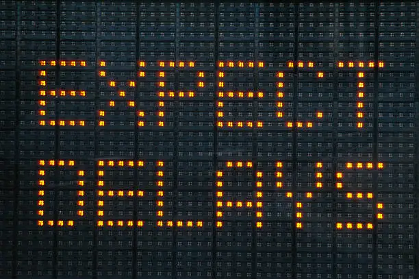 Photo of Road construction sign telling motorists to expect delays