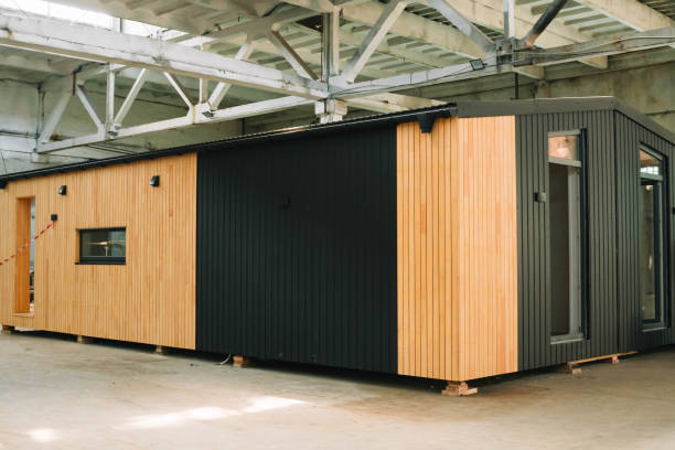 istock Modular apartment house of frame type in construction site. Mobile eco-friendly space for living and tourism 1619333474