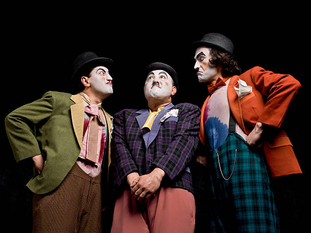 Three male mimes on the stage Three male actors acting on the stage actor stock pictures, royalty-free photos & images