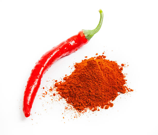 istock Paprika  with red chili peppers isolated on white 161936668