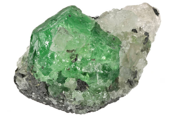 istock tsavorite garnet on quartz and graphite matrix from Merelani Hills, Tanzania 1619377584