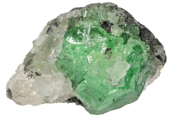 istock tsavorite garnet on quartz and graphite matrix from Merelani Hills, Tanzania 1619379168