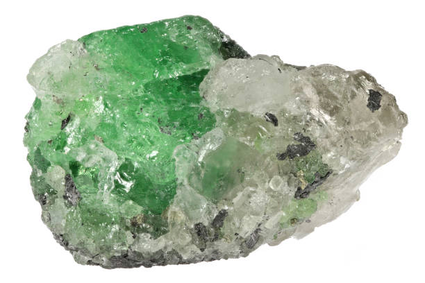 tsavorite garnet on quartz and graphite matrix from Merelani Hills, Tanzania isolated on white background