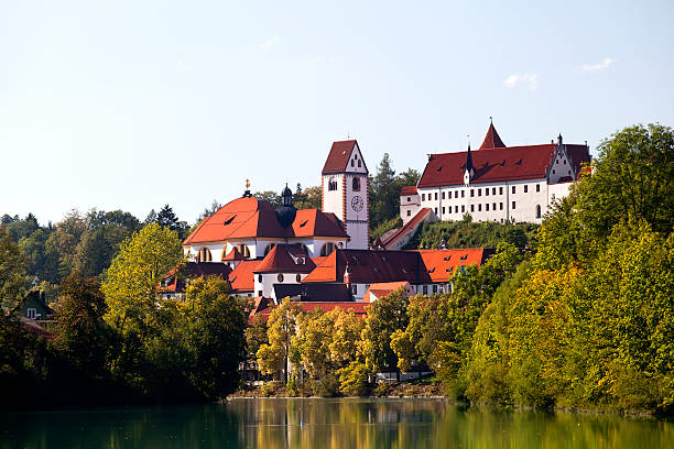 High Castle Foot and St. Mang Church charming Hohes schloss Fussen and St. Mang church, Germany fussen stock pictures, royalty-free photos & images