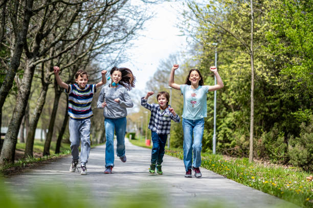 istock children running  on the track 1619425189