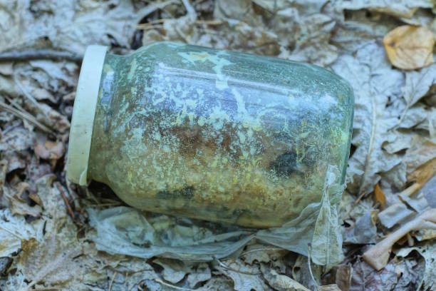 istock one old dirty glass jar closed with a white lid 1619455108