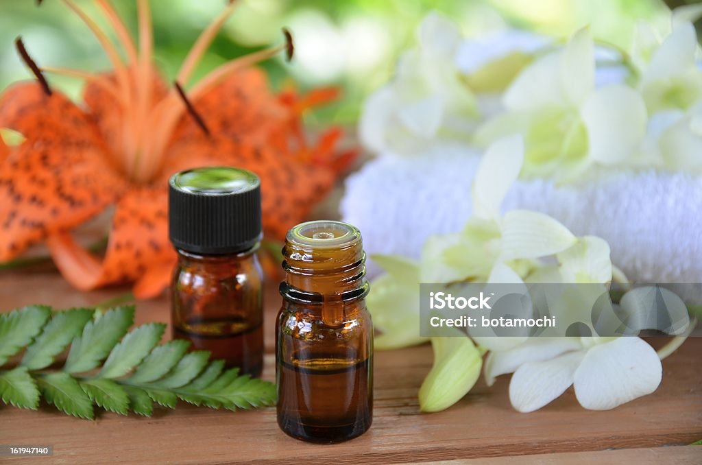 aromatherapy treatment aromatherapy oils with flowers Alternative Therapy Stock Photo