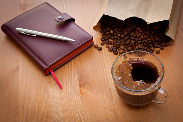 cup of coffee and  beans stock photo