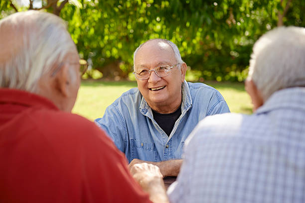 istock Group of senior men having fun and laughing in park 161949694