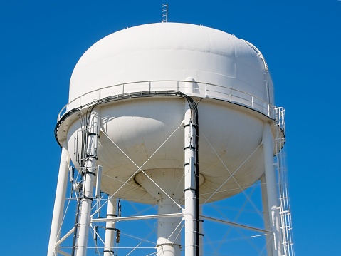 White Water Tower on a Blue Sky