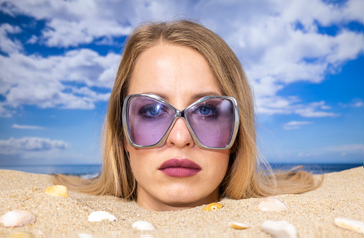 Woman Buried In Sand On Beach Stock Photo - Download Image Now - 3-D ...