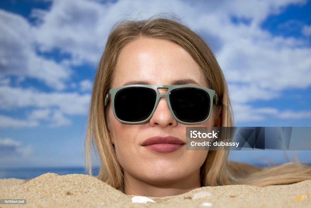 Woman Buried In Sand On Beach Stock Photo - Download Image Now - Adult ...