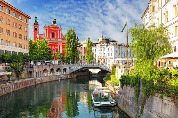 Ljubljana - Slovenia (Church and river Ljubljanica) stock photo