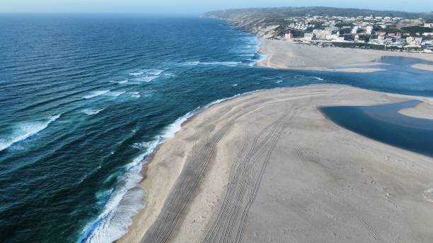 istock Drone shot of Foz do Arelho beach 1619574858