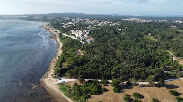 istock Drone shot of Foz do Arelho beach 1619574878