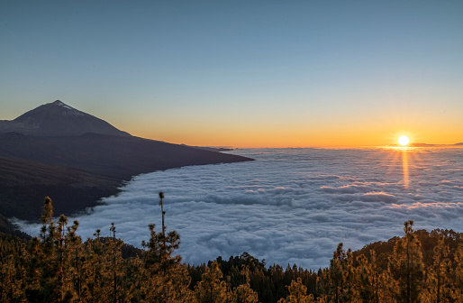 el teide volano in tenerife viewed above the clouds at night