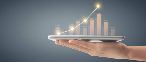 istock Plan graph growth and increase of chart positive indicators ,tablet in hand 1619627134