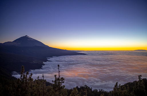 el teide volano in tenerife viewed above the clouds at night