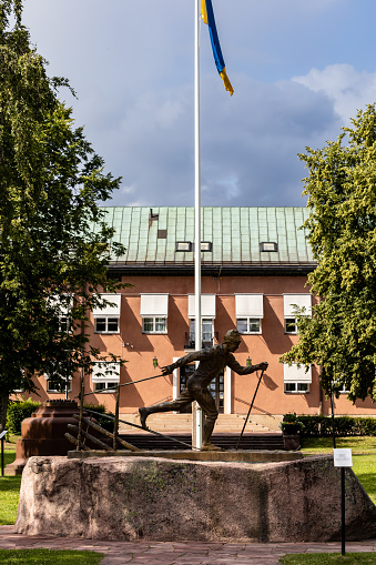 Mora, Sweden July 13, 2023 A landmark bronze statue of a cross country skier to commemorater the annual Vasaloppet winter ski race. The Vasa Race Runner from 1974 was made by Per Nilsson-Ost.